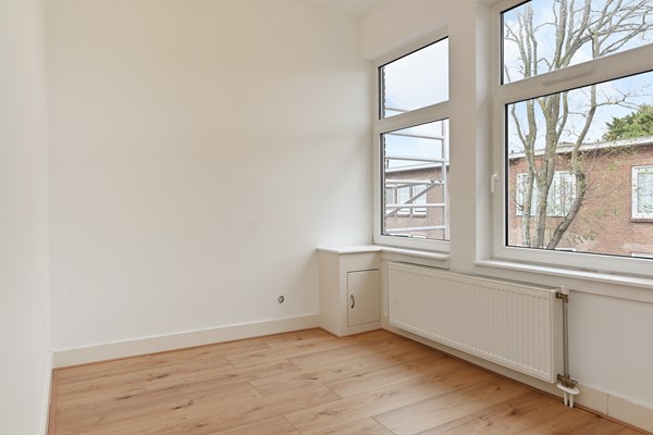Medium property photo - Deimanstraat 309, 2522 BK Den Haag